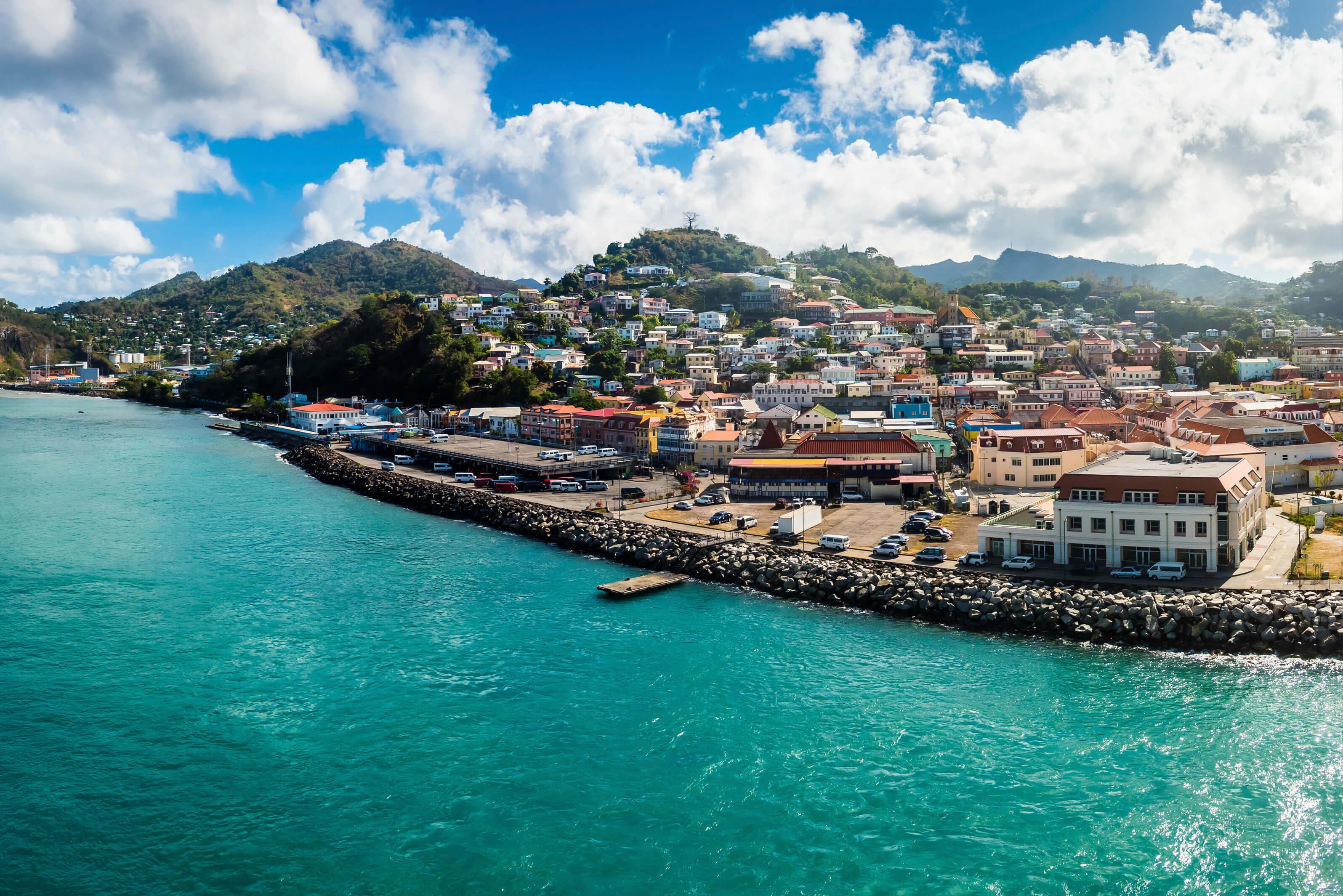 Bird's eye view of Grenada, showcasing the lush landscape and vibrant coastal waters
