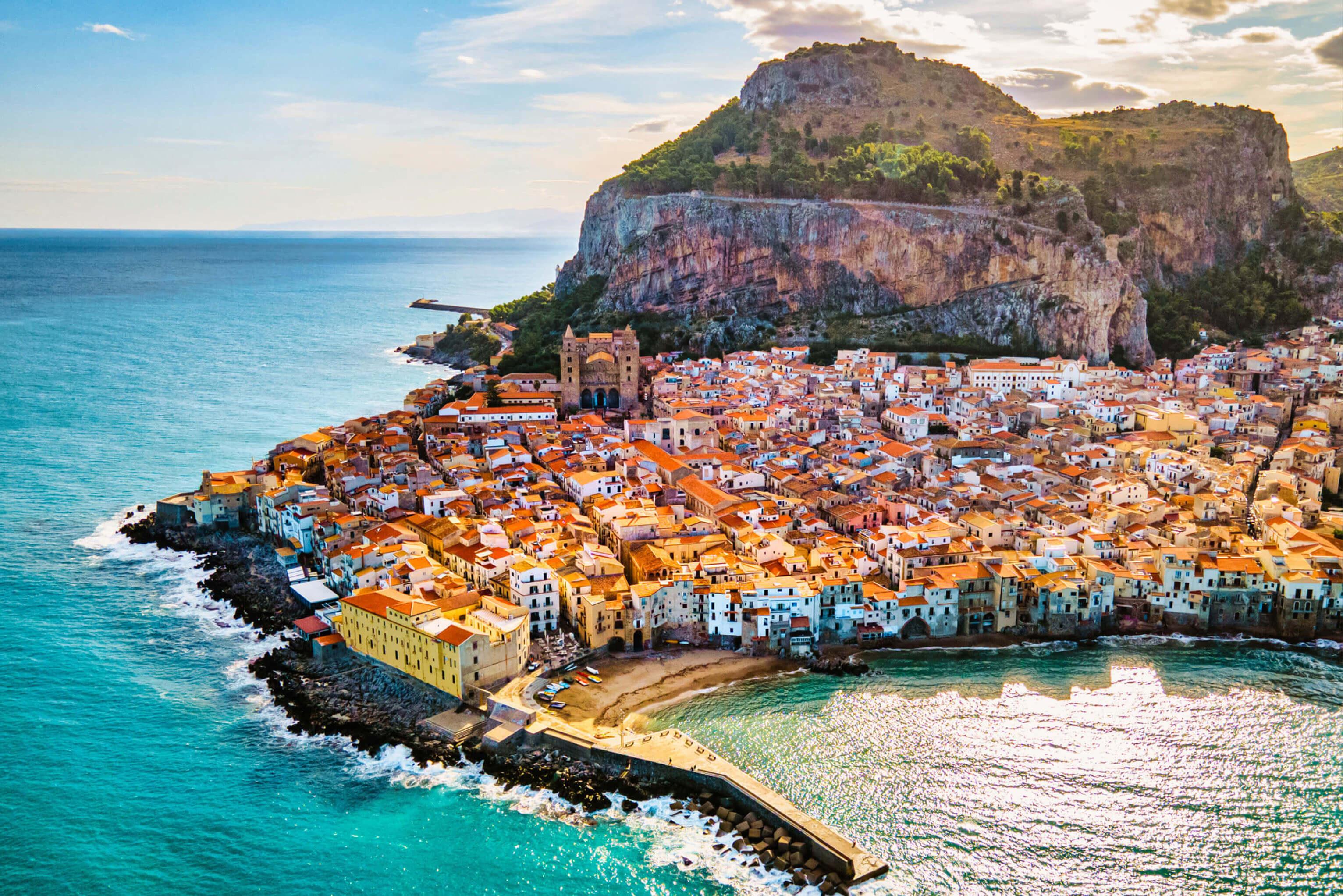 The Italian coast, showcasing cliffs, beaches, and the vibrant blue Mediterranean Sea