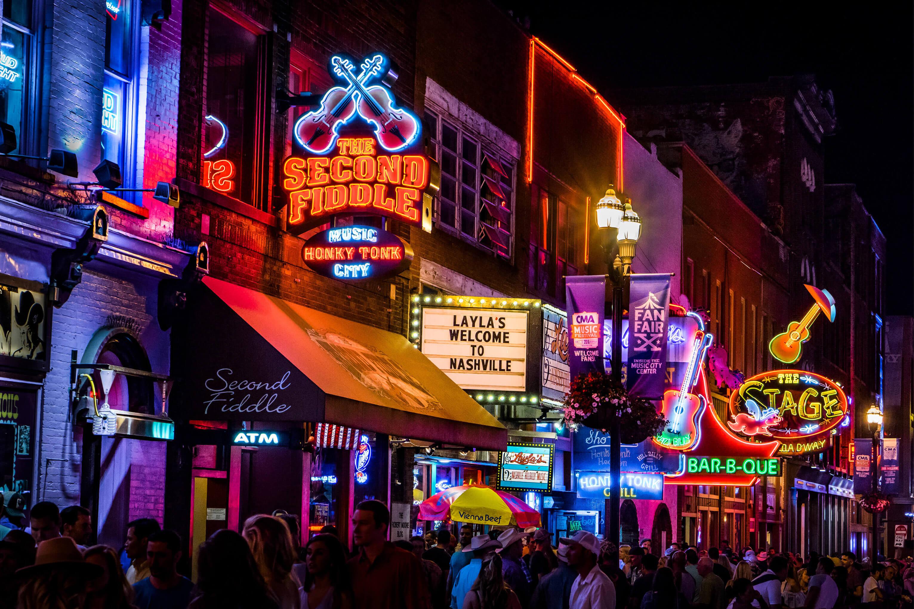 Downtown Nashville, Tennessee at night, with music venues and nightlife 